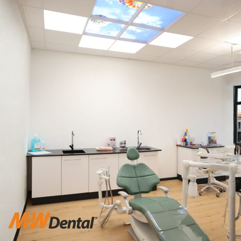 Renovated M+W Dental showroom in Büdingen featuring A-dec dental chairs illuminated by Dentled full-spectrum daylight LED panels and luminaires.