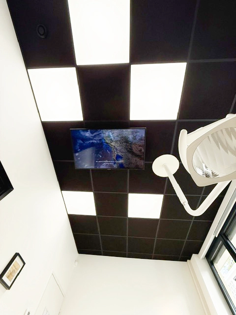 Five DentLed daylight spectrum LED ceiling panels installed above a dental treatment room in France