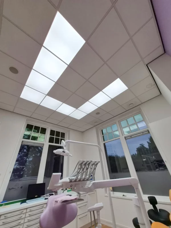 Full-spectrum daylight LED lighting from DentLED DL60 panels in a dental treatment room in Hardenberg